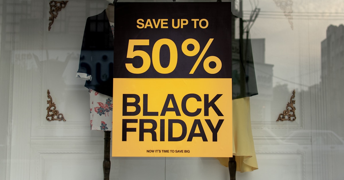 Black Friday Save 50% sale sign in shop window