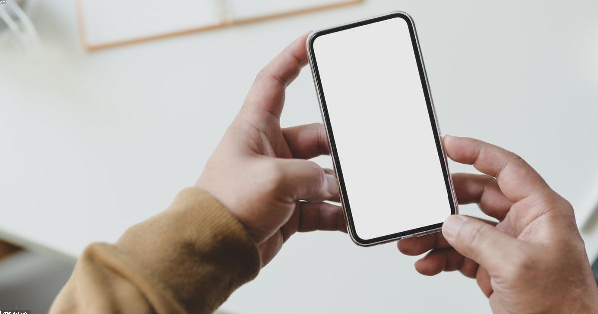 Hands holding a smartphone for mobile web browsing