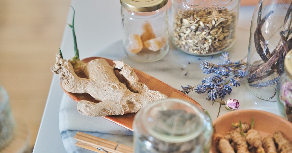 Herbal roots and dried herbs in mason jars